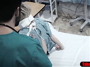 medic gives patient a sponge bath and vaginal inspect